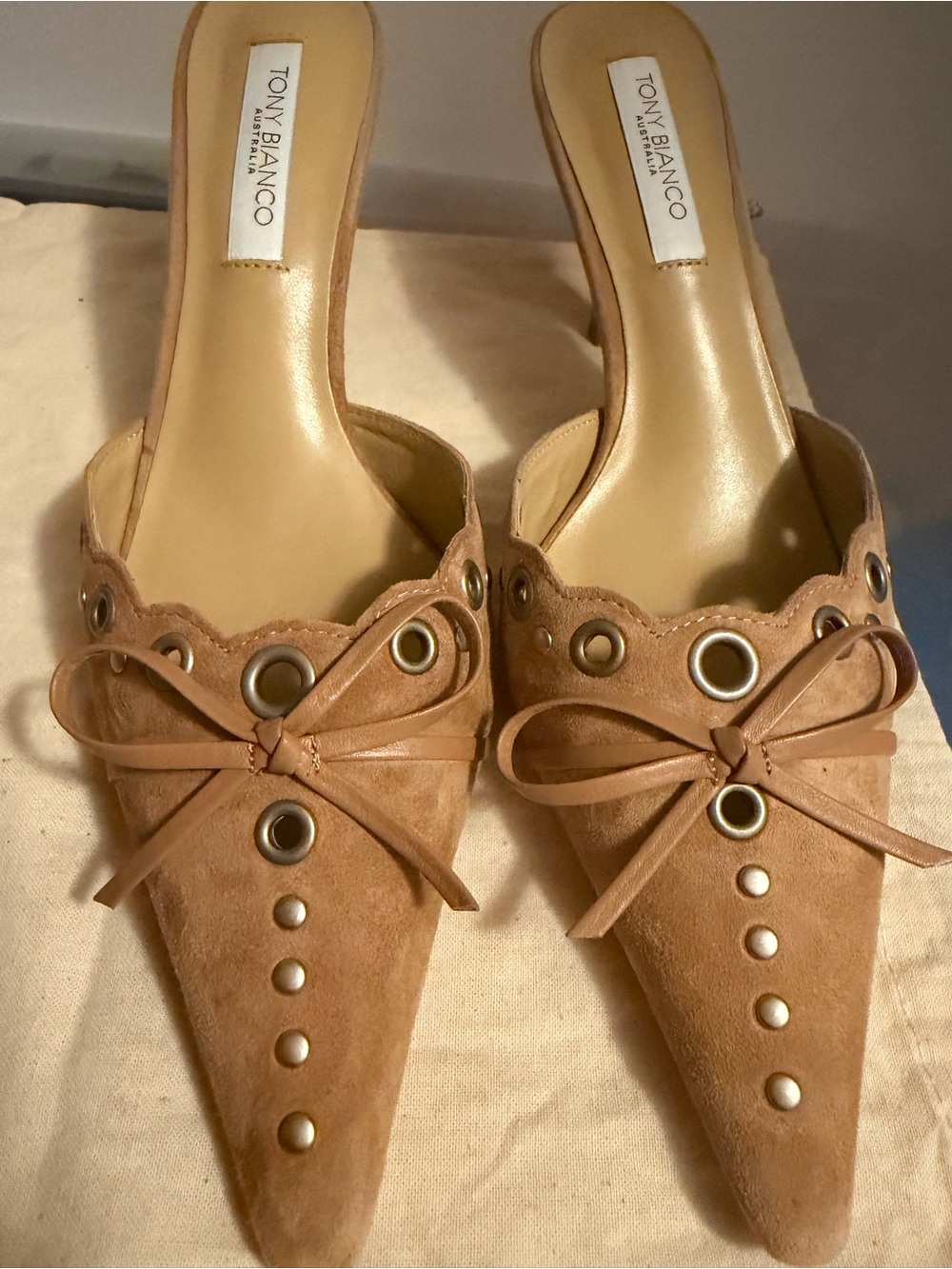 Tony Bianco Tan Suede Pointed Mule with Grommet & Bow Detail